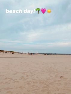 there is a beach day sign in the sand