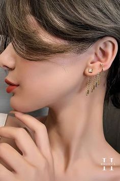 Add a touch of elegance to your outfit with our Gold Tassel Ear Cuff Earrings. ✨ Don't miss out on our amazing deals: Buy one, get one 50% off on all rings 💍 or mix & match any three earrings or necklaces and get one free! Shop now and make a statement! Link in bio. https://holicca.com/products/copy-of-layered-ear-cuff-earrings --- #holicca_fashion #rings #jewelry #earrings #necklace #fashion #gold #accessories #silver #bracelets #style Pearl Ring Design, Three Earrings, Gold Statement Jewelry, Gold Pearl Jewelry, Ear Cuff Earrings, Beautiful Pearl Necklace