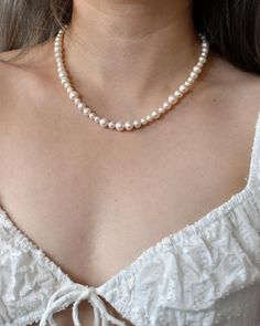 Beautiful and timeless, elevated by mixed size pearls. Handcrafted with real, high luster freshwater pearls, and 14k gold-filled hardware. Includes a 3" extender chain. DETAILS. * Freshwater pearls 6-8mm * 14k gold-filled * Lobster clasp with 3" extender chain If you want a custom size, please message me. PLEASE NOTE. Natural materials like freshwater pearls and gemstones are unique, like you and I. Thus, each jewelry piece is one of a kind and will deviate slightly from the photos shown. Imperf Classic Baroque Pearl Necklace With High Luster, High Luster Baroque Pearl Classic Necklace, Classic Round Baroque Pearl Necklace, Classic Baroque Pearl Necklace In Pearl White, Jewelry Care Instructions, Pure Gold, Jewelry Pouch, Jewelry Care, Natural Materials