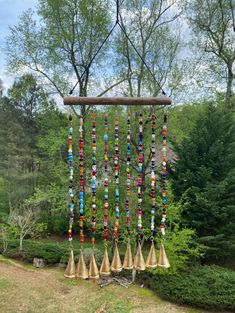 "Joyous Wind chimes, 18 inch Soothing Sound of the Multi-Color Beaded Bell Wind Chime, The sound can create a sense of peace and relaxation in your patio and sunroom.  The outdoor vibrant wind chime features an array of gold-colored, cone-shaped bells. Each bell dangles at the end of a strand of eclectic, multi-colored beads that are each suspended from a wooden dowel. Hang it from a secure hook or branch and listen to its song as it blows in the breeze. Dimensions: Length:  17.5\" H  Width: 11\ Windchimes Diy, Glass Wind Chimes, Vbs Crafts, Outdoor Classroom, Soothing Sounds, Witch Decor, Color Dorado, Crafty Diy, Blue Glass