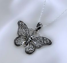 Well detailed sterling silver butterfly pendant. The butterfly is a symbol of change, joy and color. Butterflies were considered a miracle of transformation and resurrection.  In Christianity, the butterfly is the resurrection symbol. FEATURE: . Solid 925 Sterling silver Pendant.   . Solid 925 Sterling Silver chain. . Need to add charms? http://etsy.me/ZQ2KkF . Additional Meaningful Jewelry: http://www.JewelrywithAMeaning.etsy.com  I offer fine jewelry made out of 92.5% Sterling Silver, fine jewelry can last for generations, and it is often considered an investment or something worth collecting and passing down to family members. Rest assure my jewelry does not have allergic metals like nickel or lead. Fashion jewelry is not made of precious metals. Please drop me a note during checkout in Silver Butterfly Necklace With Butterfly Clasp, Silver Sterling Butterfly Necklace, Silver Sterling Butterfly Necklace With Butterfly Clasp, Silver Butterfly Charm Necklace In Sterling Silver, Silver Butterfly Necklace In Sterling Silver, Silver Spiritual Jewelry With Butterfly Charm, Spiritual Silver Necklace With Butterfly Charm, Spiritual Silver Jewelry With Butterfly Charm, Spiritual Silver Butterfly Necklace