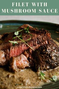 steak with mushroom sauce on a green plate