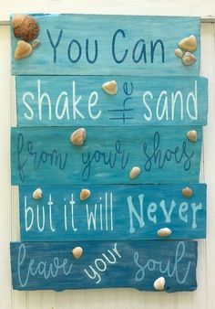 a sign that says you can shake the sand from your shoes but it will never leave you soul