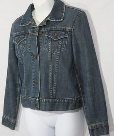 Here's an awesome late 90's Gap jean jacket! This classic trucker cut denim coat has a really cool and different dark blue wash that seems to include a sepia / antiqued wash quality to it. You'll love it and how soft and quality the thick denim feels and looks. This collectible Gap streetwear jacket is so versatile too. You can wear it with a ton of different looks and articles in your closet - it really is a wardrobe staple. This GAP jean jacket is also in excellent condition with very little s 90s Style Dark Wash Denim Jacket For Fall, 90s Dark Wash Denim Jacket For Fall, Vintage Button-up Medium Wash Denim Jacket, Vintage Dark Wash Single-breasted Denim Jacket, Vintage Pre-washed Denim Blue Outerwear, Vintage Cotton Denim Jacket, Pre-washed, Vintage Pre-washed Cotton Denim Jacket, Jean Vintage, Gap Jeans