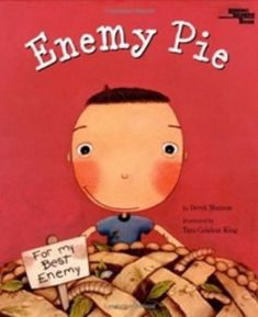 the book cover for enemyy pie is shown with an image of a boy sitting on top of a pile of bread