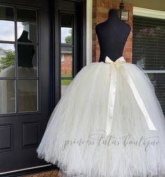 This listing includes an Ivory Bridal Tutu with a wide ivory double faced satin bow. This tutu ties around your waist with the ribbon. This does allow the tutu to be adjusted tighter or loosened if needed as well. You would want to measure around where you'd like to wear the tutu for the perfect "waist" size measurement. You then would select the length range that you would desire and make a note in the note to seller section of the length you would like to go with.   Ivory tutu pictured is the Maternity Tutu, Adult Tutu Skirt, Bachelorette Tutu, Adult Tulle Skirt, Adult Cake Smash, Princess Tutu, Ivory Bridal, Tulle Fabric, Tutu Skirt