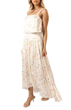 Made for summertime soirées, this freshly blooming two-piece dress features a camisole-style crop top and a gathered-to-flatter high-low skirt. Top has hidden side-zip closure; square neck Skirt has hidden side-zip closure; back elastic waist; high-low hem Lined 55% polyester, 45% rayon Hand wash, dry flat Imported Spring Rayon Sundress With Spaghetti Straps, Rayon Sundress With Spaghetti Straps For Spring, Feminine Two-piece Spring Dresses, Feminine Two-piece Dresses For Spring, Summer Two-piece Tiered Skirt Dresses, Summer Two-piece Dresses With Tiered Skirt, Feminine Maxi Dress For Daytime In Summer, White Two-piece Summer Dress, Spring Vacation Two-piece Maxi Dress