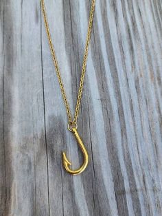 "Fish hook necklace!  Hook is gold plated and measures 26x16mm. It is on an 18\" gold plated stainless steel chain.  *can replace chain with longer 24\" chain if requested when ordered *each additional item ships for only $1" Adjustable Gold Jewelry With Fish Hook, Brass Jewelry With Fish Hook For Gift, Fish Hook Necklace, Indian Rocks Beach, Hook Necklace, Star Bracelet, Fish Hook, Steel Chain, Stainless Steel Chain