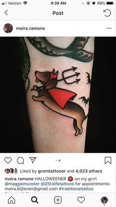 a person with a tattoo on their arm that has a dachshund in it