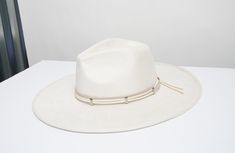 Be ready for whatever adventures life throws at you with the Lack of Heads Take the Scenic Route Fedora Hat! Soft felt shapes this essential fedora with a semi-structured wide-brim and a traditional tear-drop crown. Matching satin ribbon band adds just the perfect amount of something' extra! Internal drawstrings allow for the perfect fit. Spot Clean 100% Polyester Please Read Before Purchasing: Our hats are made to fit average head sizes, the average adult head circumference to be 55cm (21 3⁄4 ) Fedora Hats For Women, Felt Shapes, Black Fedora Hat, Tied Ribbon, Eggshell White, Suede Hat, Black Fedora, Hat Styles, Fedora Hat Women