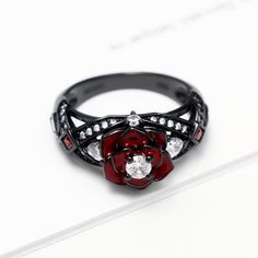 Red Ring With Diamond Accents For Promise, Red Rings With Diamond Accents For Promise, Red Promise Ring With Diamond Accents, Elegant Red Flower-shaped Ring, Elegant Red Flower Shaped Rings, Diamond Rose Design Promise Ring, Diamond Promise Ring With Rose Design, Diamond Rings With Rose Design For Promise, Fine Jewelry Rose Design Ring