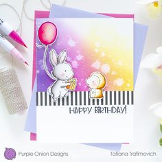 a birthday card with a bunny holding a balloon