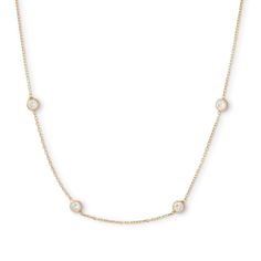 From the Made in Italy Collection, this 3.5mm bezel-set cubic zirconia station necklace is set in 10K gold. The diamond-cut forzatina cable chain measures 12 inches in length, with a 4-inch extender, and secures with a spring-ring clasp. Gold Bezel-set Station Necklace, Diamond Station Necklace With Bezel Setting For Gift, Classic Station Necklace With Bezel Setting For Anniversary, Classic Bezel Set Station Necklace As Gift, Classic Bezel Set Station Necklace For Anniversary, Yellow Gold Station Necklace With Bezel Setting, Dainty Gold Station Necklace With Bezel Setting, Station Necklace, 10k Gold