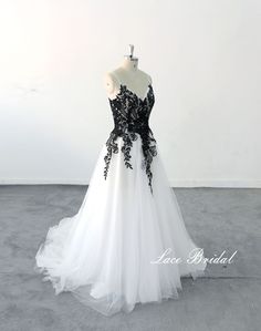 a black and white wedding dress on a mannequin