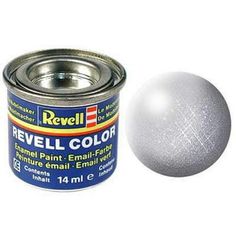 a can of silver metallic paint next to an empty metal ball