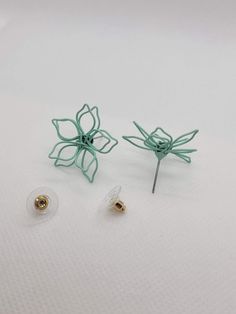 These earrings are made out of wire in the shape of a flower and then painted! There are two sizes pictured, and these are the LARGER of the two sizes. See my shop for the smaller size! @green.goddess.gift Green Flower Shape Earrings For Spring, Green Flower Shaped Earrings For Spring, Green Flower-shaped Earrings For Spring, Green Flower Earrings For Spring, Green Flower-shaped Pierced Earrings, Green Flower Earrings For Gifts, Green Whimsical Flower Shaped Earrings, Spring Green Flower Earrings With Ear Wire, Spring Green Flower Earrings