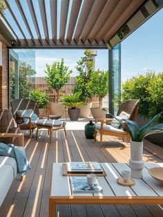 an outdoor living area with wooden flooring and furniture