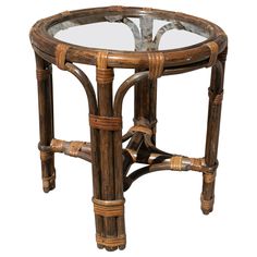 a round table with glass top and bamboo frame around the base, on white background