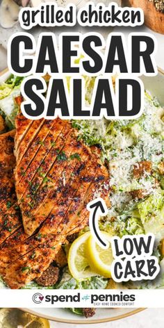 grilled chicken caesar salad on a plate with lemon wedges and parmesan cheese