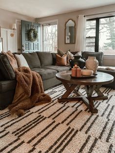 the living room is clean and ready for us to use it's new furniture