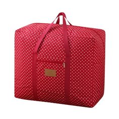 a red and white polka dot duffel bag