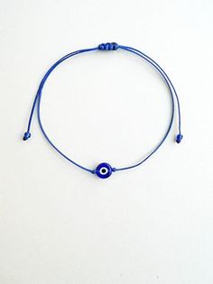 Blue Evil Eye Bracelet With Sliding Knot As Gift, Blue Evil Eye Bracelet With Sliding Knot For Gift, Minimalist Evil Eye Bracelet For Everyday, Blue Resizable Evil Eye Bracelet, Blue Evil Eye Bracelet Gift, Evil Eye Bracelet For Everyday Wear, Blue Minimalist Jewelry With Sliding Knot, Minimalist Blue Jewelry With Sliding Knot, Minimalist Blue Friendship Bracelets