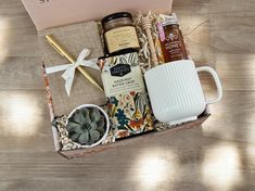 a gift box with coffee, honey and other items