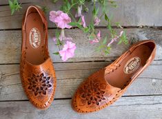 New womens brown leather authentic flower leather stamped mexican huarache shoe sandal Brown Slip-on Leather Shoes For Summer, Brown Leather Slip-on Shoes For Summer, Summer Brown Leather Shoes With Stitched Sole, Brown Leather Shoes With Stitched Sole For Summer, Vintage Sandals With Flat Heel And Rubber Sole, Vintage Flat Heel Sandals With Rubber Sole, Vintage Leather Shoes With Leather Sole For Summer, Brown Closed Toe Huarache Sandals With Leather Footbed, Summer Brown Leather Slip-on Shoes