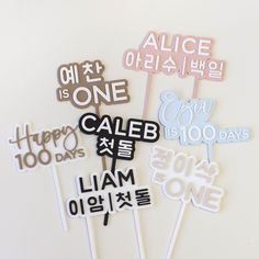 a bunch of cake toppers that are on a stick