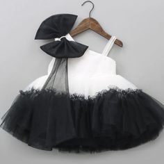 The black and white collection 🖤🤍 For a classy look at any occasion and to add a little bit of sassy 💁‍♀️ 1 year to 8 years ❣️ The fabric is premium and super soft on the child’s skin. Having light weight clothes in breezy colours will make your little one enjoy every day and be more happy and delighted. Breathable fabrics and perfect stitching make it a must have the kids wardrobe closet. Perfect for any special occasion, this dress promises both comfort and style. Make your little angel... Baby African Clothes, Layered Hem Dress, Dress With One Shoulder, Baby Fancy Dress, Kids Dress Collection