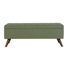 an upholstered bench with wooden legs and a light green fabric cover on it