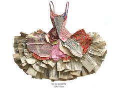 a woman's dress made out of old newspaper strips and other paper items on a white background