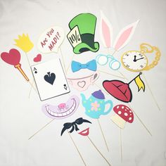 an assortment of photo props on a white background