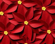 red and yellow paper flowers are arranged together