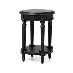 a small black table with two legs on it