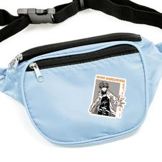 a blue fanny bag with a black and white design on it