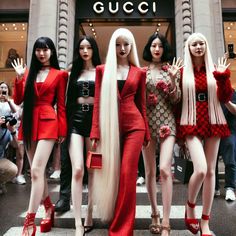 several models in red and black outfits standing on the street