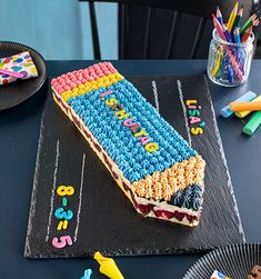 a birthday cake is sitting on a table