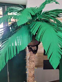 a palm tree made out of construction paper