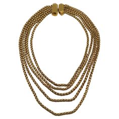 YVES SAINT LAURENT by ROBERT GOOSSENS vintage gold tone multi-strand chain necklace featuring a rock-crystal shape design clasp. Hook clasp closure. Embossed YSL Made in France. Indicative measurements : length approx. 54 cm (21.26 inches). Material : Gold tone metal hardware. NOTES - This is a preloved vintage item, therefore it might have imperfections. - Colors may differ slightly from actual product appearance due to differences in lighting conditions. - As a buyer, you are fully responsible Luxury Vintage Single Strand Necklace, Saint Laurent Vintage, Vintage Yves Saint Laurent, Crystal Shapes, Hook Clasp, Multi Strand Necklace, Rock Crystal, Metal Hardware, Multi Strand