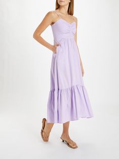 The Claudina Dress is an easy sundress, with a sexy edge. Its sweetheart neckline is elevated by a ruched bodice, creating a perfect fit in the bust. Cut from a lightweight cotton, this dress features gathering in the back and adjustable straps. Its lavender hue is the color of the season. Designed by founder Beth Buccini.[tab] Composition: 96% Cotton, 4% Spandex Size and Fit: Runs True to Size. Model is 5'9" and wears a size S. Care Instructions: Dry Clean Only Origin: Made in USA SKU: KZ48PINA Purple Sundress, Ruched Bodice, Purple Dress, Exclusive Collection, Fit In, Sweetheart Neckline, Sundress, Bodice, Care Instructions