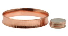 A slender bangle bracelet is a must-have for any woman's accessory collection, and the John S. Brana Chased Anticlastic Copper Bangle Bracelet is the perfect choice to complete your jewelry box or a special lady's. The styling possibilities for this chic handmade copper bangle are truly unlimited. Wear it on its own for a simple accent or purchase more than one and wear them together for a Boho beautiful layer effect. Mix and match the bangle with cuff, wrap and bangle bracelets to show off your Boho Beautiful, Handmade Copper, Sleek Design, Bangle Bracelets, Jewelry Box, Copper, Bangles, Cuff, Women Accessories