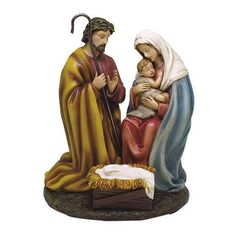 a nativity figurine depicting the birth of jesus with his mother and child