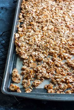 a pan filled with granola sitting on top of a counter