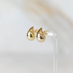 This raindrop stud is a must-have fashion accessory. It's a designer look for less with a stylish raindrop shape, making it perfect for an on trend look. Lightweight and comfortable, this raindrop stud is sure to make a statement. *This stud earring is available in Gold or Silver Chosen Family, Bead Store, Rain Drops, Must Haves, Fashion Accessories, Stud Earrings, Beads, Silver, Gold