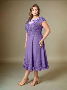 This Plus Size Tea Length Lace Appliques Chiffon Mother Of The Bride Dress is perfect for the mother of the bride who wants to look elegant and sophisticated. Made with delicate lace appliques and flowy chiffon fabric, this dress is designed to flatter plus size figures. The tea length adds a touch of modesty while still showcasing the legs.    Attention!     The neckline is see-through and unlined. (Refer to the picture below) Lace Mother Of The Bride Dress With Lace Trim, Mother Of The Bride Dress With Lace Trim, Lace Mother Of The Bride Dress With Lace Patchwork, Mother Of The Bride Dress With Illusion Neckline, Mother Of The Bride Evening Dress With Lace Bodice, Elegant Purple Lace Wedding Dress, Elegant Mother Of The Bride Dress With Lace Patchwork, Tea-length Mother Of The Bride Dress For Party, Spring Tea-length Dress With Box Pleat