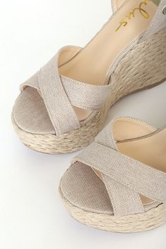 Pair your new maxi dress with the Lulus Esme Natural Lace-Up Espadrille Wedges! Beige canvas straps cross over a peep-toe upper, while a matching ankle strap (with silver grommets) supports wide laces that wrap and tie around the ankle. 4. 75" espadrille-wrapped wedge. Cushioned insole. Nonskid rubber sole. All vegan friendly, man made materials. Imported. Lulus | Esme Natural Lace-Up Espadrille Wedges | Size 6.5. Beige Cross Strap Sandals For Spring, Beige Cross-strap Sandals For Spring, Lace Up Espadrille Wedges, Lace Up Espadrilles, Wedge Espadrille, Espadrilles Wedges, Vegan Friendly, Sandal Espadrille, Ankle Strap