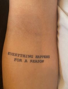 a person with a tattoo that says everything happens for a reason on their left arm