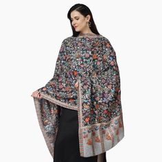 Elevate your style with the Kashmiri Kalamkari Wrap in Black, a unique hand painted scarf crafted from luxurious Merino wool. Experience the beauty of traditional kalamkari art with this must-have accessory. 100% Fine Merino Wool Hand Aari Work Embroidery Outing Kalamkari wraps are hand painted and augmented with intricate hand embroidery on the print of the wrap. One Size: 28 Inch (Width) X 80 Inch (Length) | (71 cm X 203 cm) Ideal & Elegant gift Choice! solve your gifting worries today with so Winter Motifs Shawl, Traditional Pashmina Scarves For Festive, Traditional Multicolor Embroidered Shawl For Winter, Traditional Pashmina Scarves For Festive Occasions, Traditional Wear With Pashmina And Traditional Patterns, Traditional Multicolor Scarves For Winter, Traditional Semi-stitched Winter Dupatta, Traditional Scarves With Motifs For Eid, Traditional Multicolor Winter Scarf