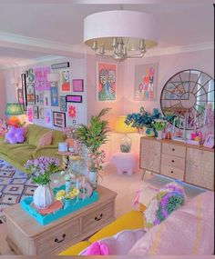 a living room filled with lots of furniture and flowers in vases on the coffee table